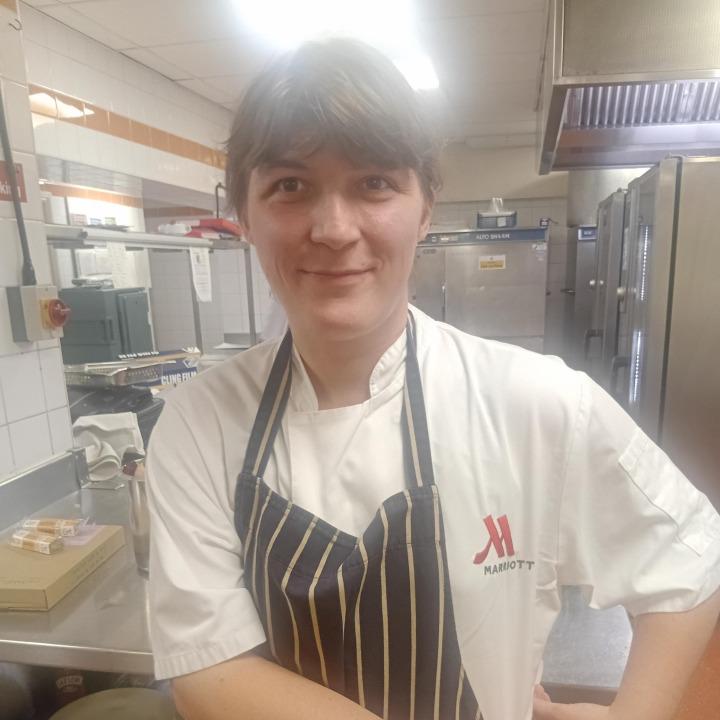 one of our Supported Interns in a kitchen